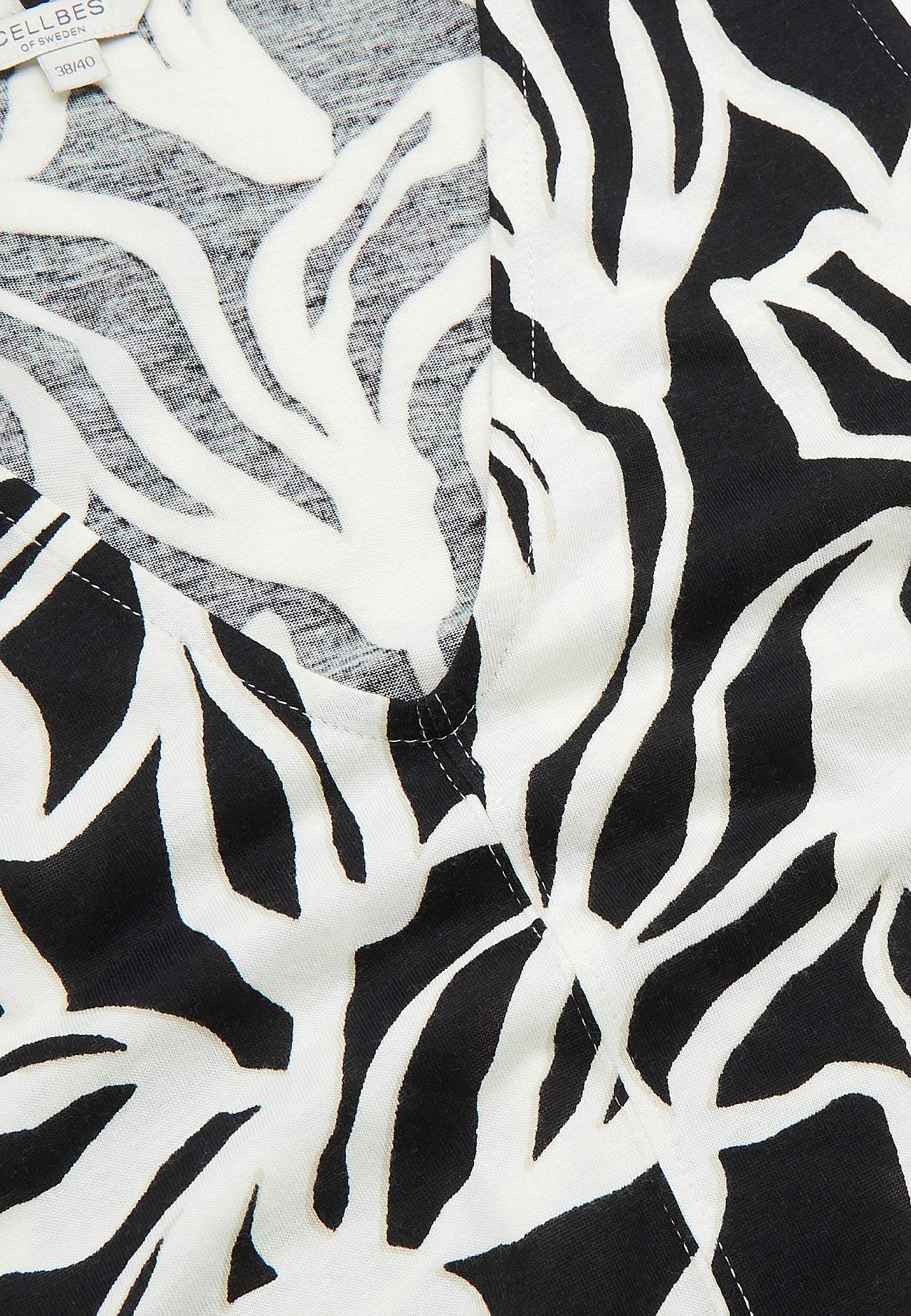 Mouwloze jerseyjurk met een v-hals