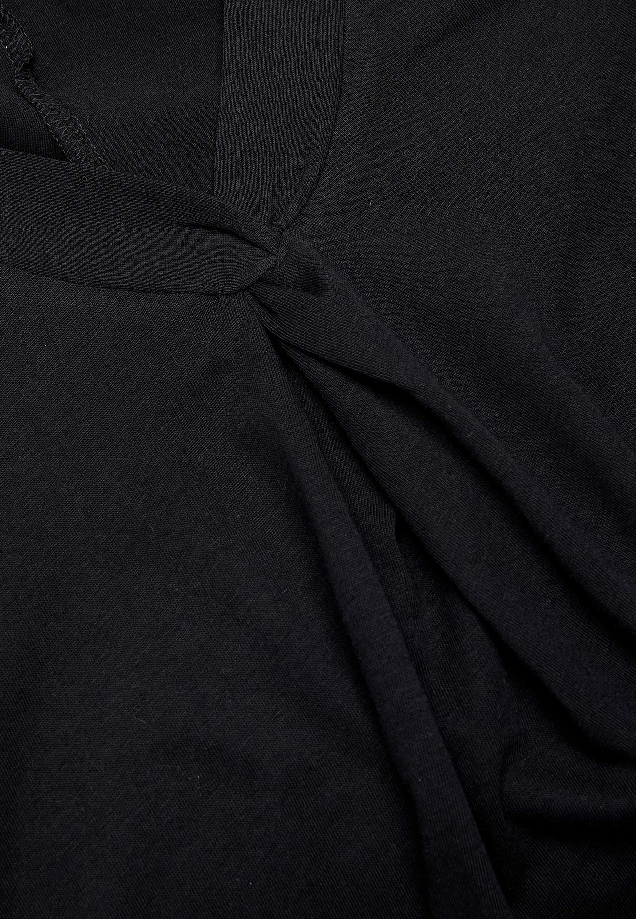 Mouwloze jerseyjurk met een v-hals