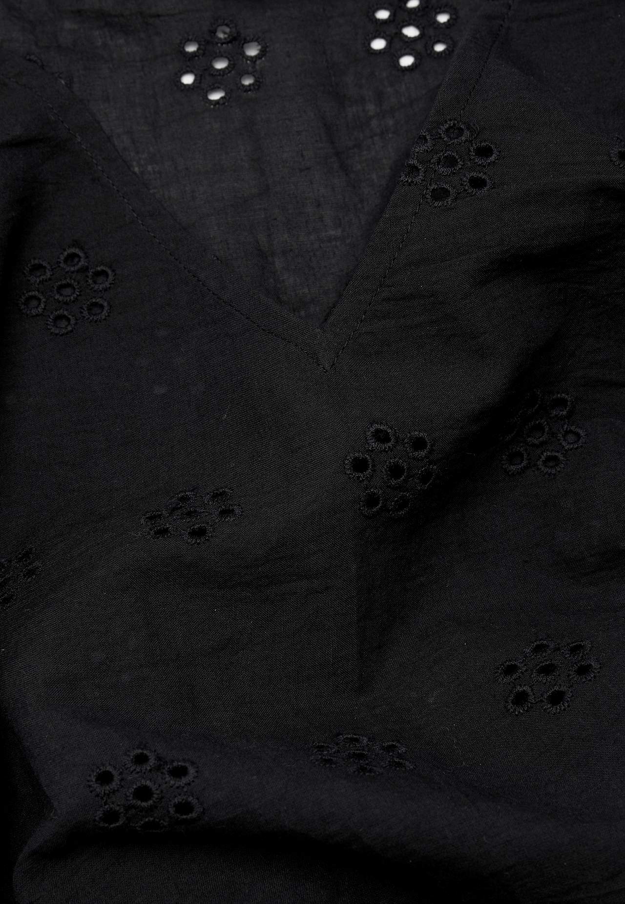 Tuniek met borduurwerk met gaten