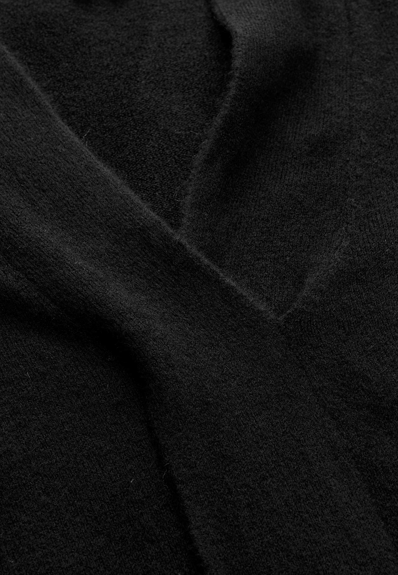 Gebreide tuniek met gedraaid detail