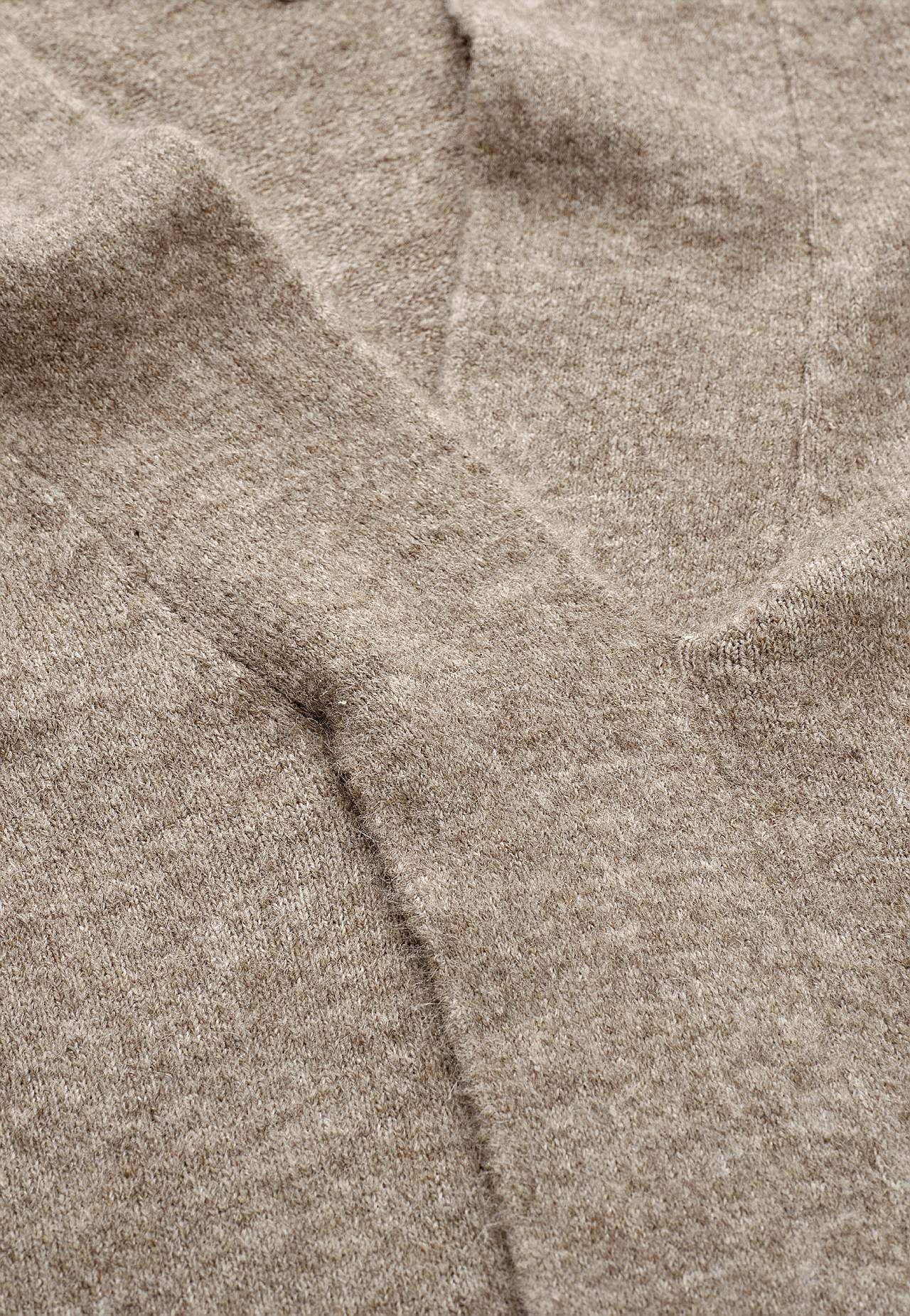 Gebreide tuniek met gedraaid detail