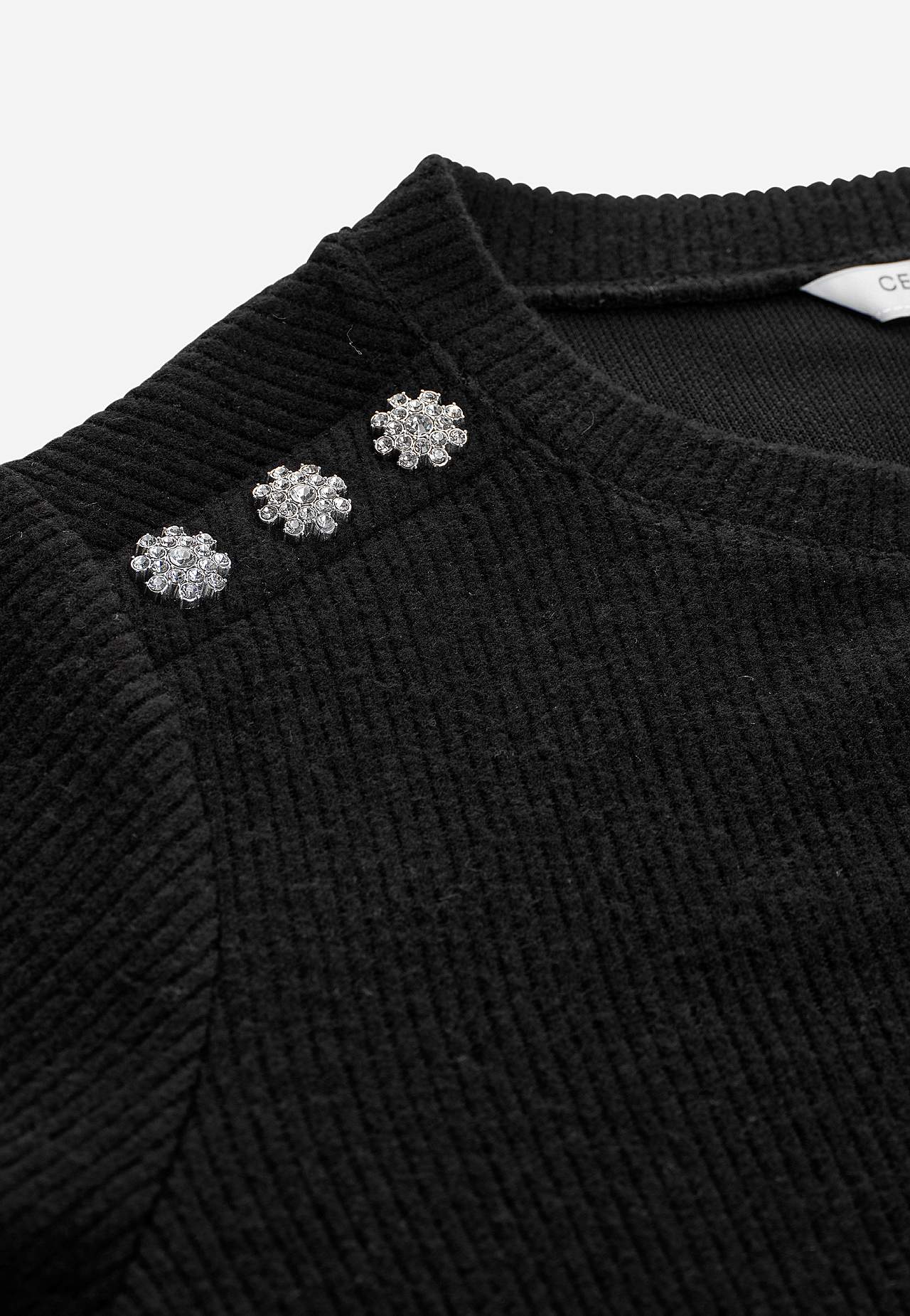 Geribbelde tuniek met strass-knopen