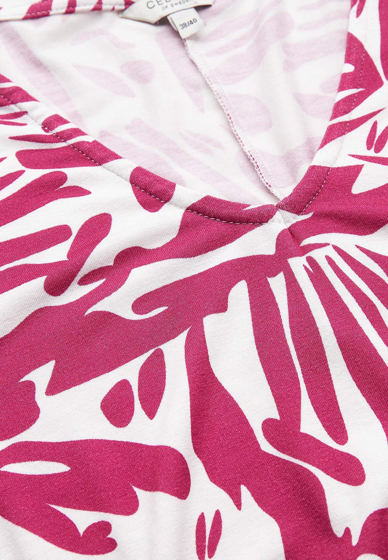 Jerseyjurk met pofmouwen