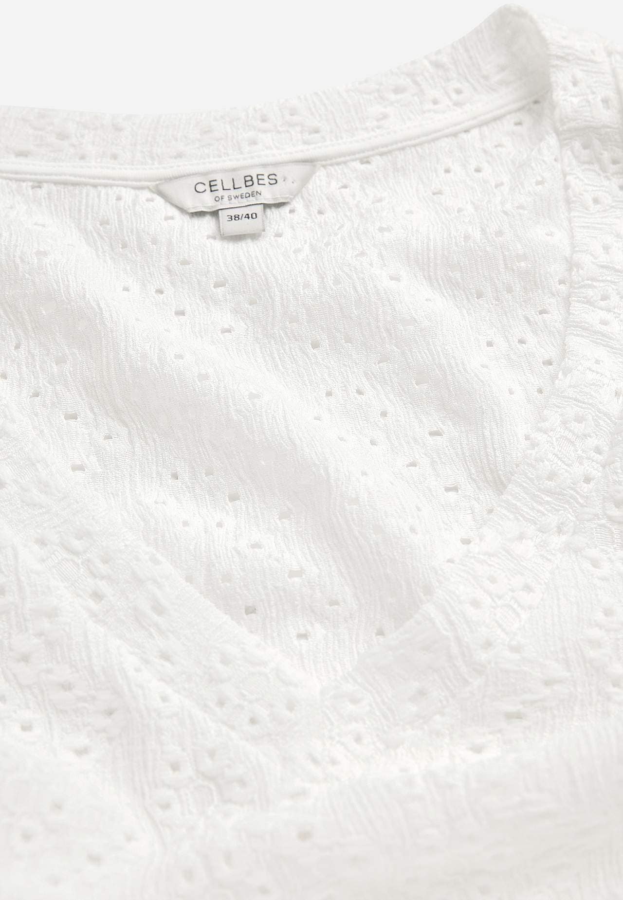 Jersey-topje met borduurwerk met gaten