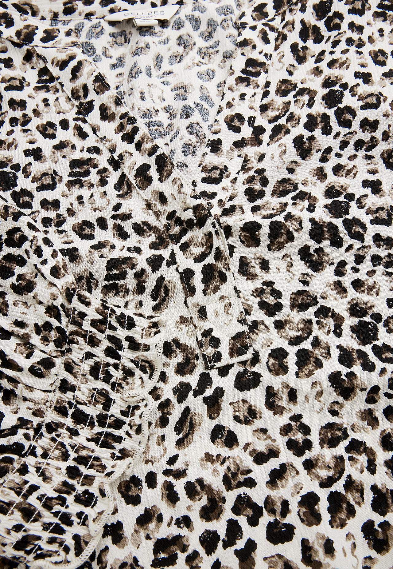 Van crèpe bloes