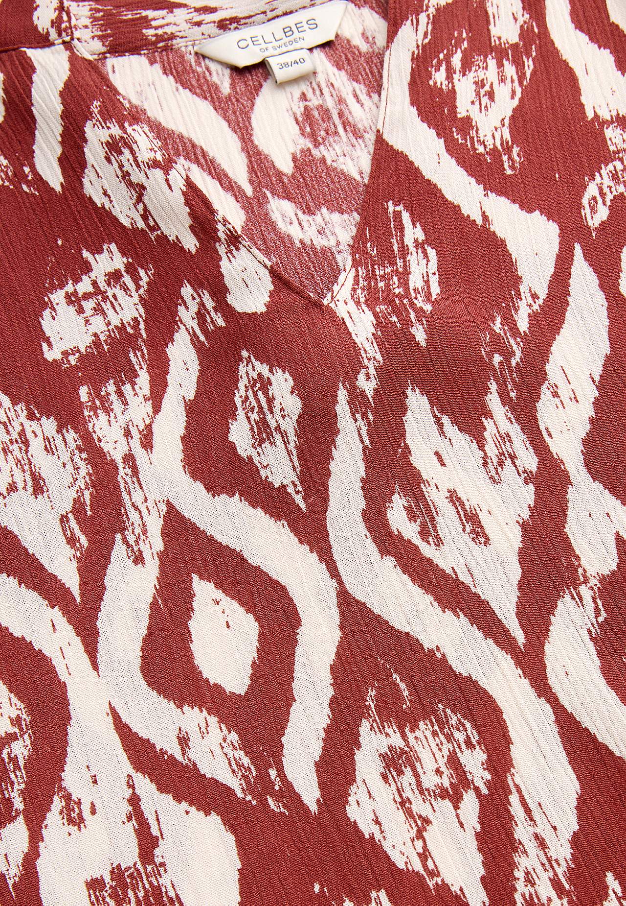Van crèpe tuniek