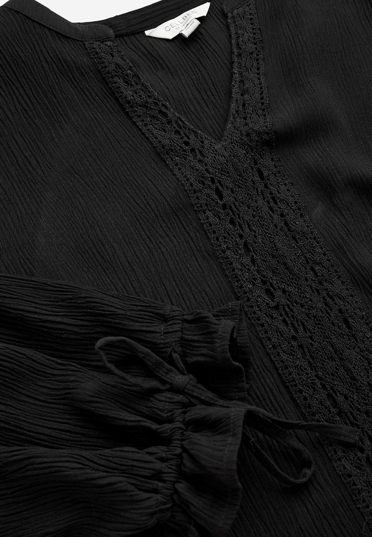 Van crèpe tuniek