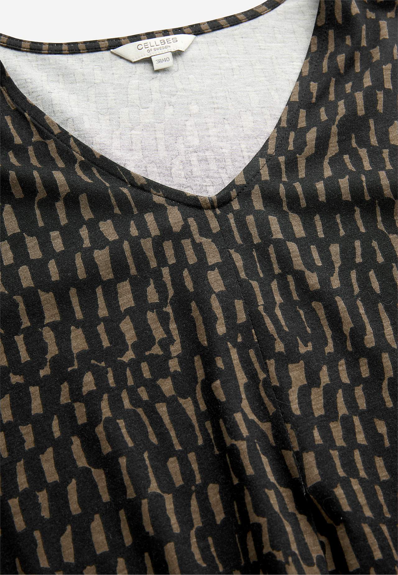 Jerseyjurk met een v-hals