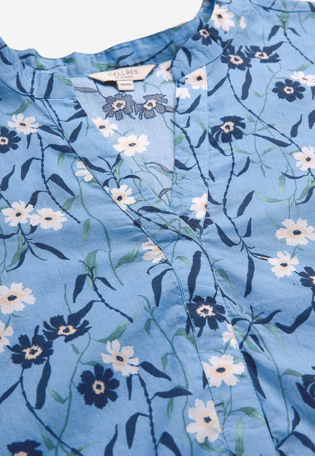 Gevlochten tuniek met een bloemenpatroon