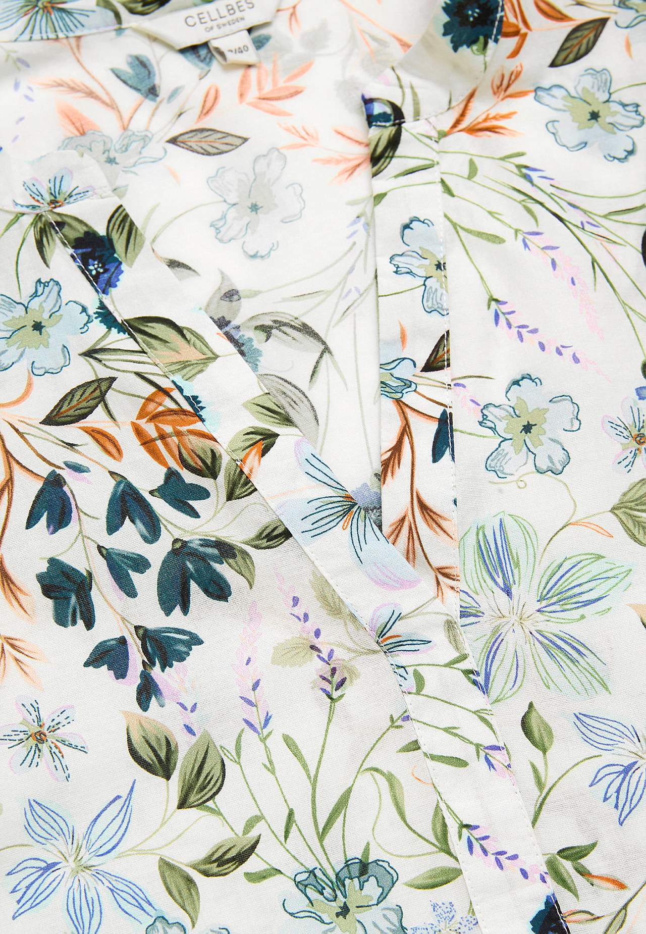 Gevlochten tuniek met een bloemenpatroon