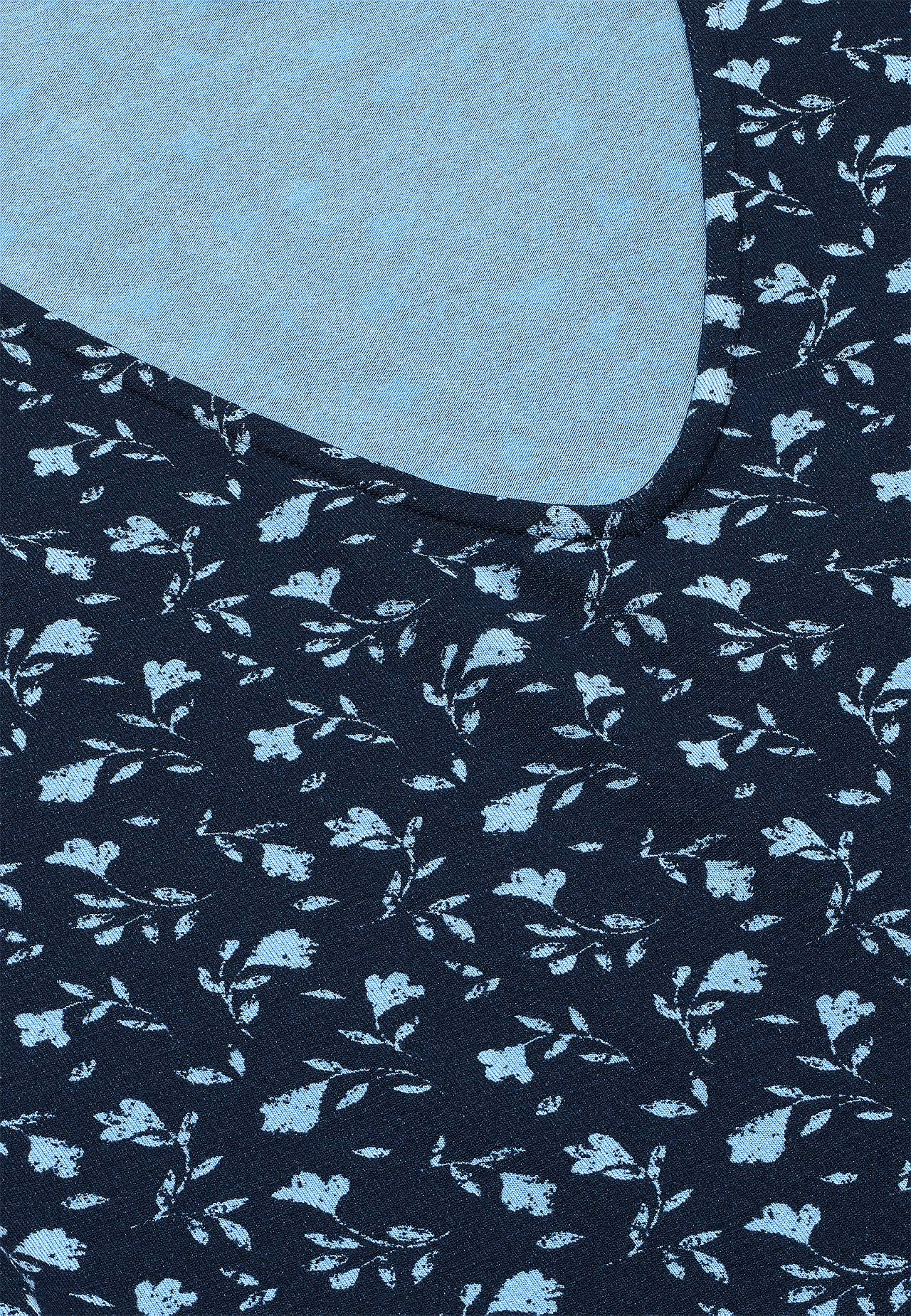 Jerseyjurk met een bloemenpatroon en zakken