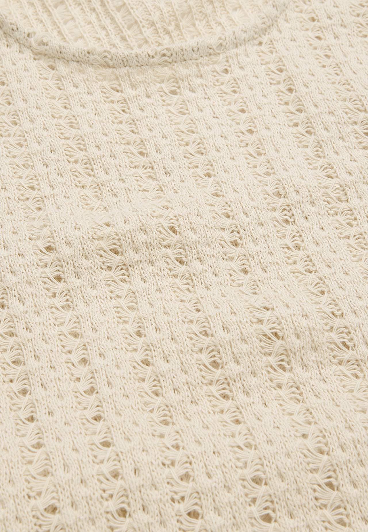 Jersey-topje met gatenpatroon