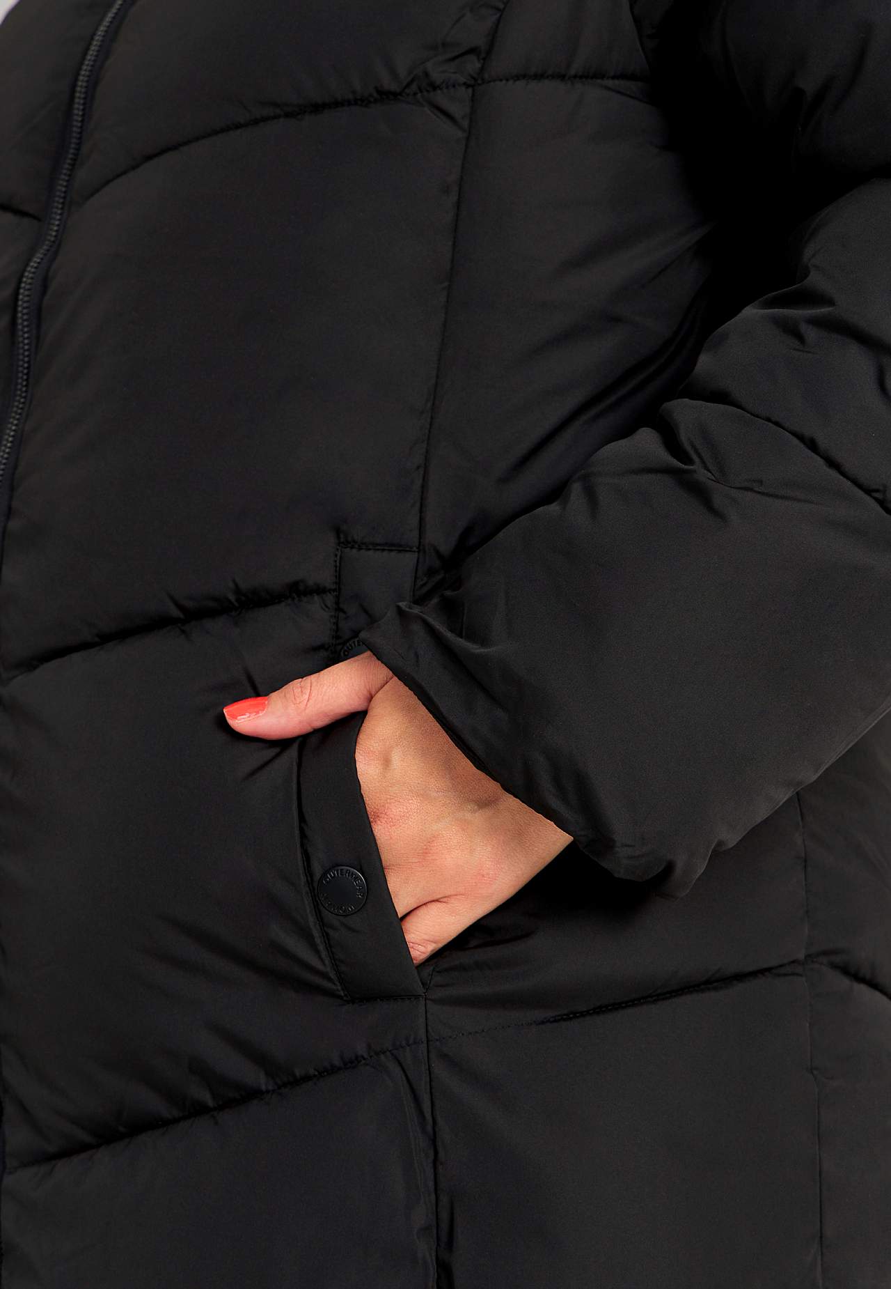 Lange jas met pluizige vulling