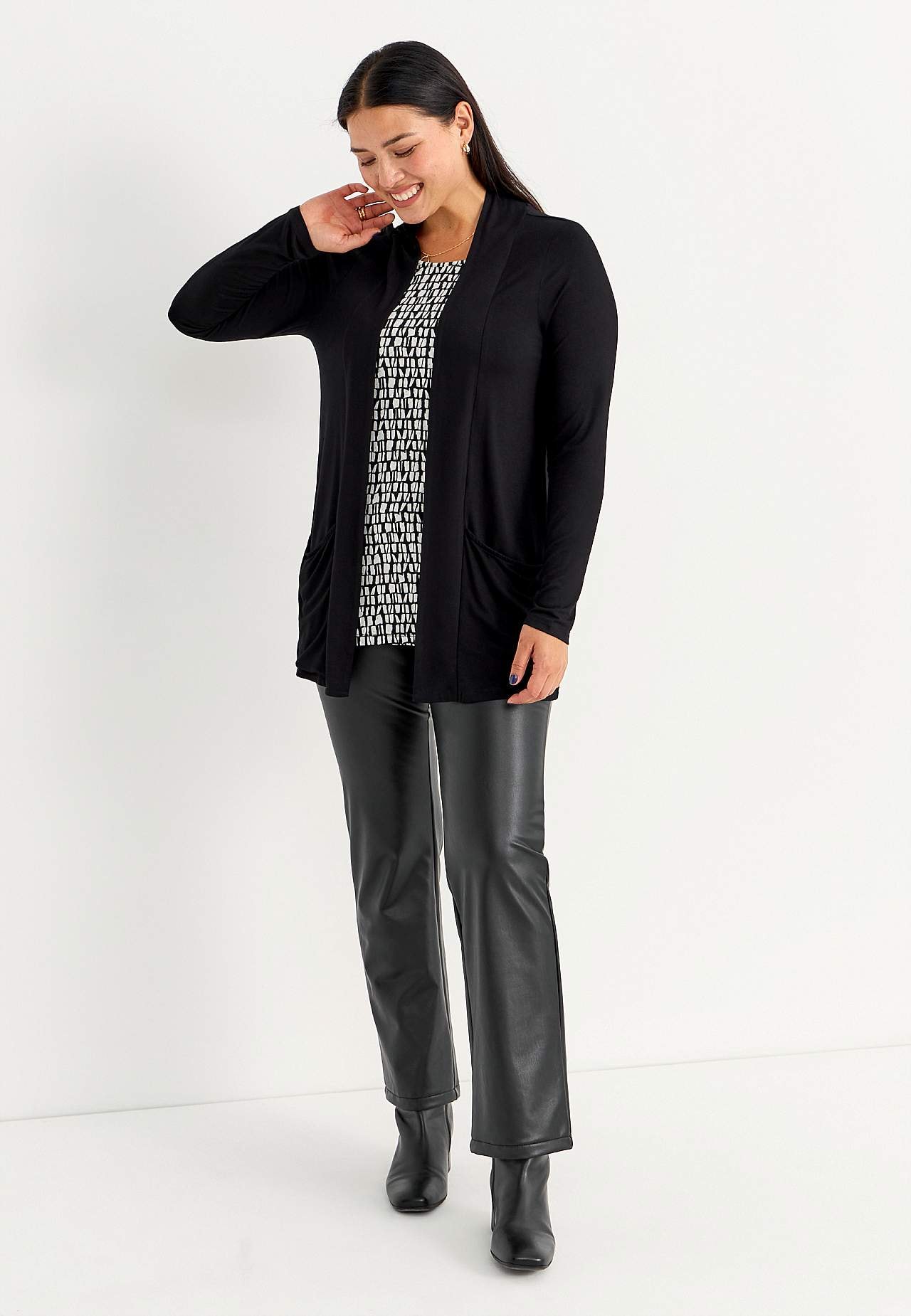 Gecoate en uitlopende legging