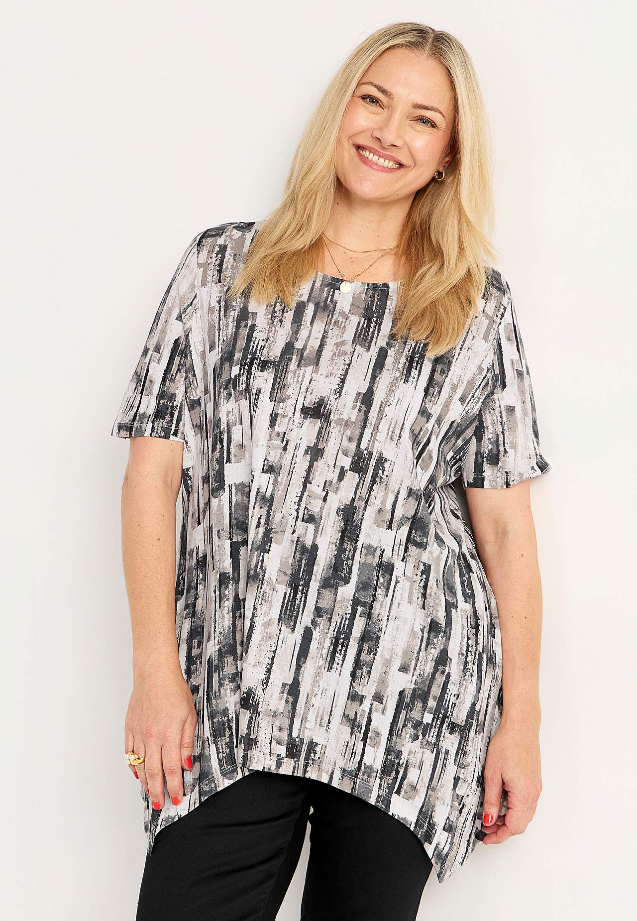 Asymmetrische jersey tuniek