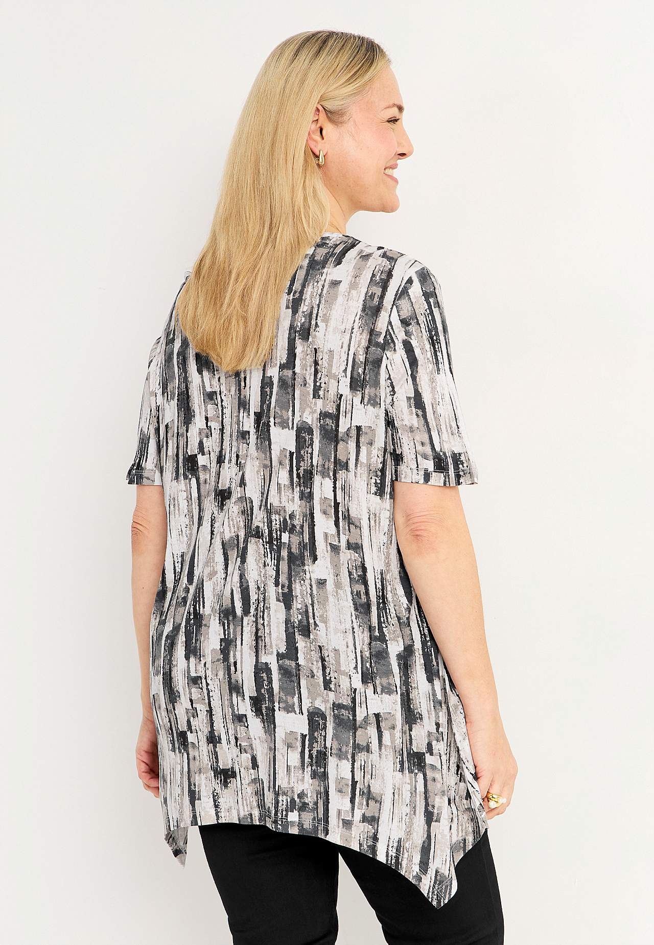Asymmetrische jersey tuniek