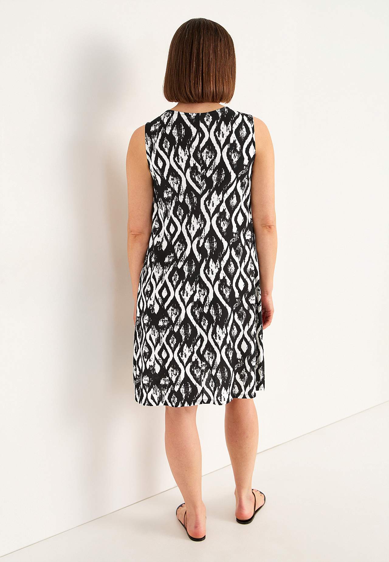 Mouwloze jerseyjurk met een v-hals