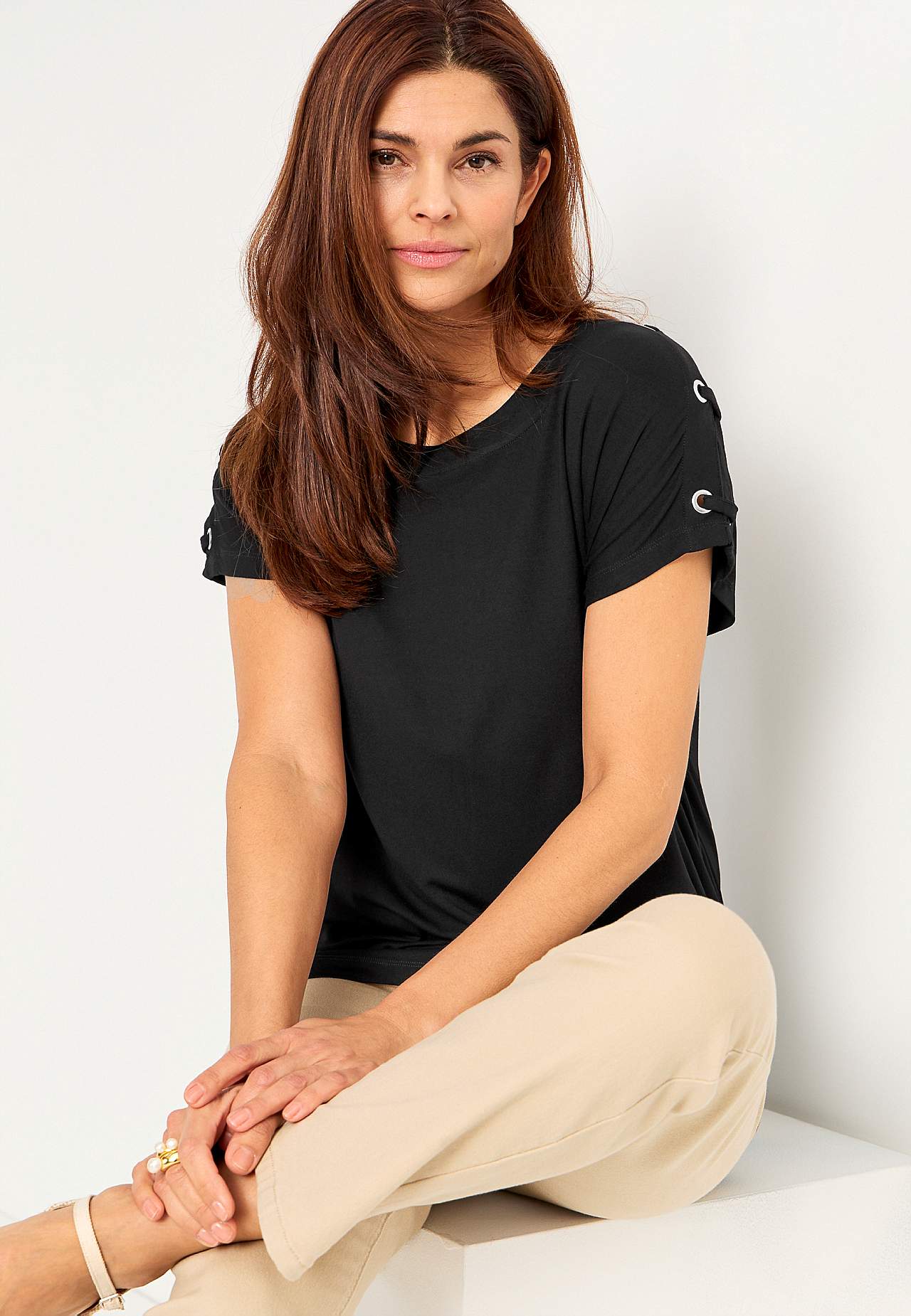 Jersey-topje met decor op de schouder