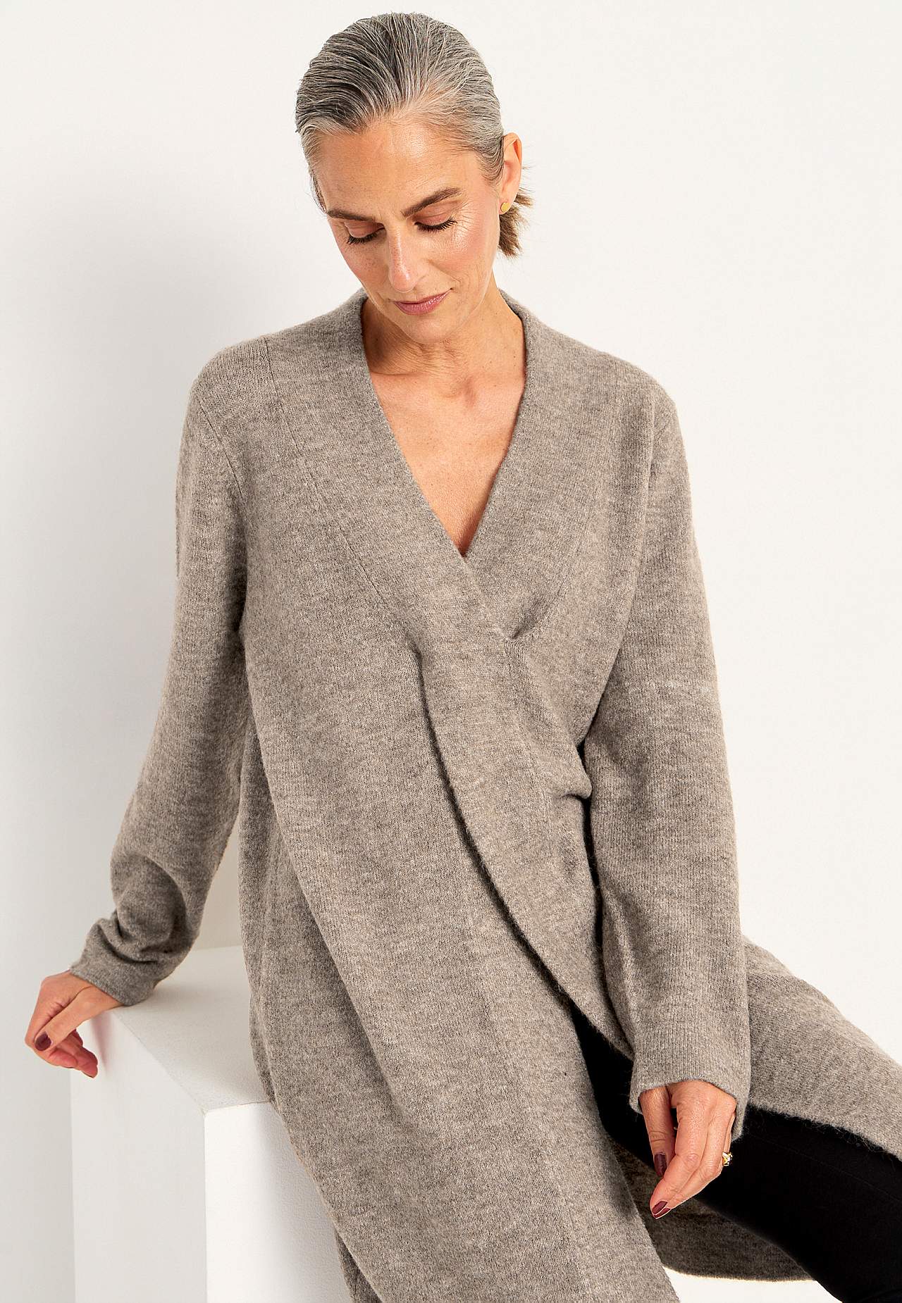 Gebreide tuniek met gedraaid detail