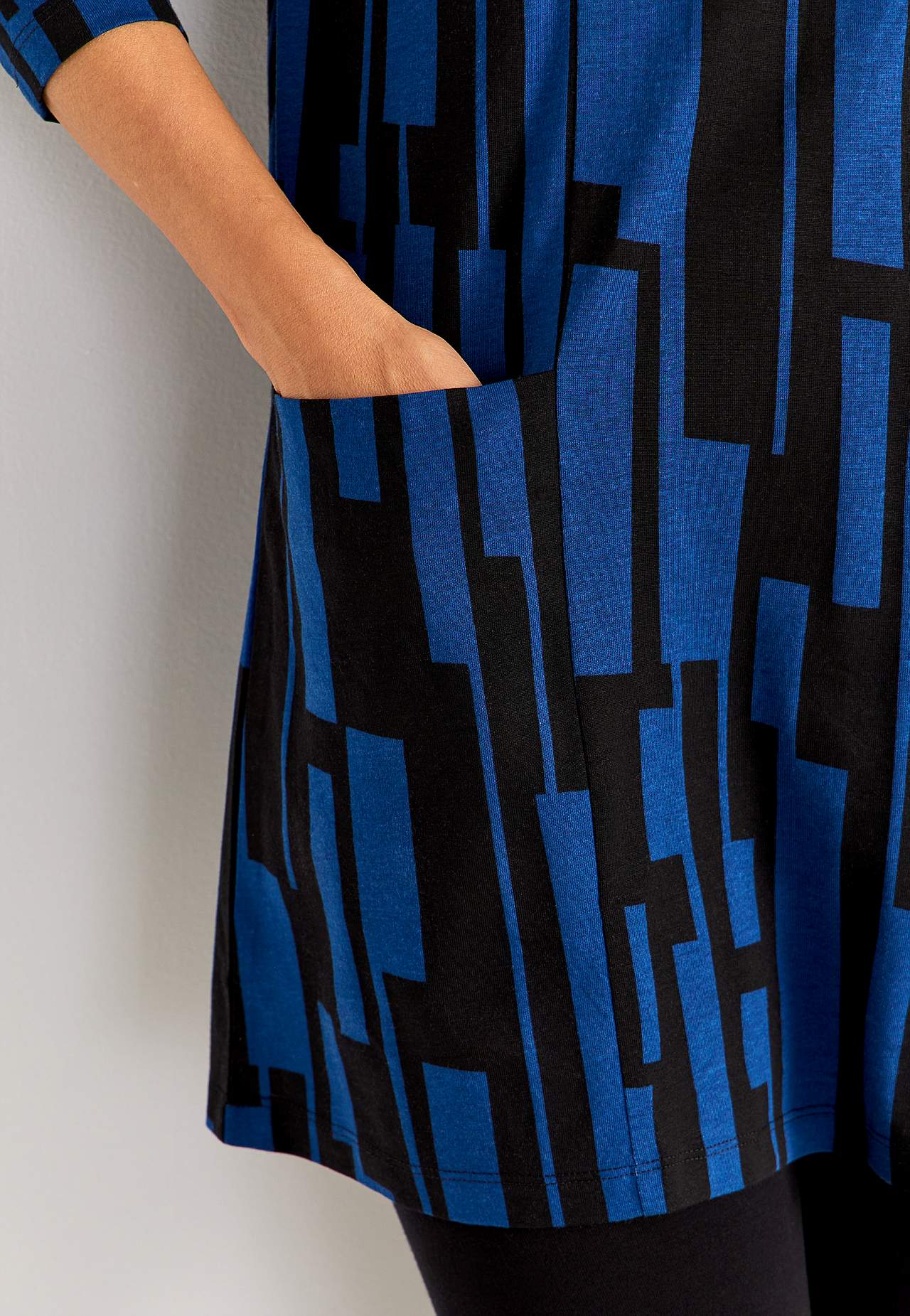 Jersey tuniek met zakken en een v-hals