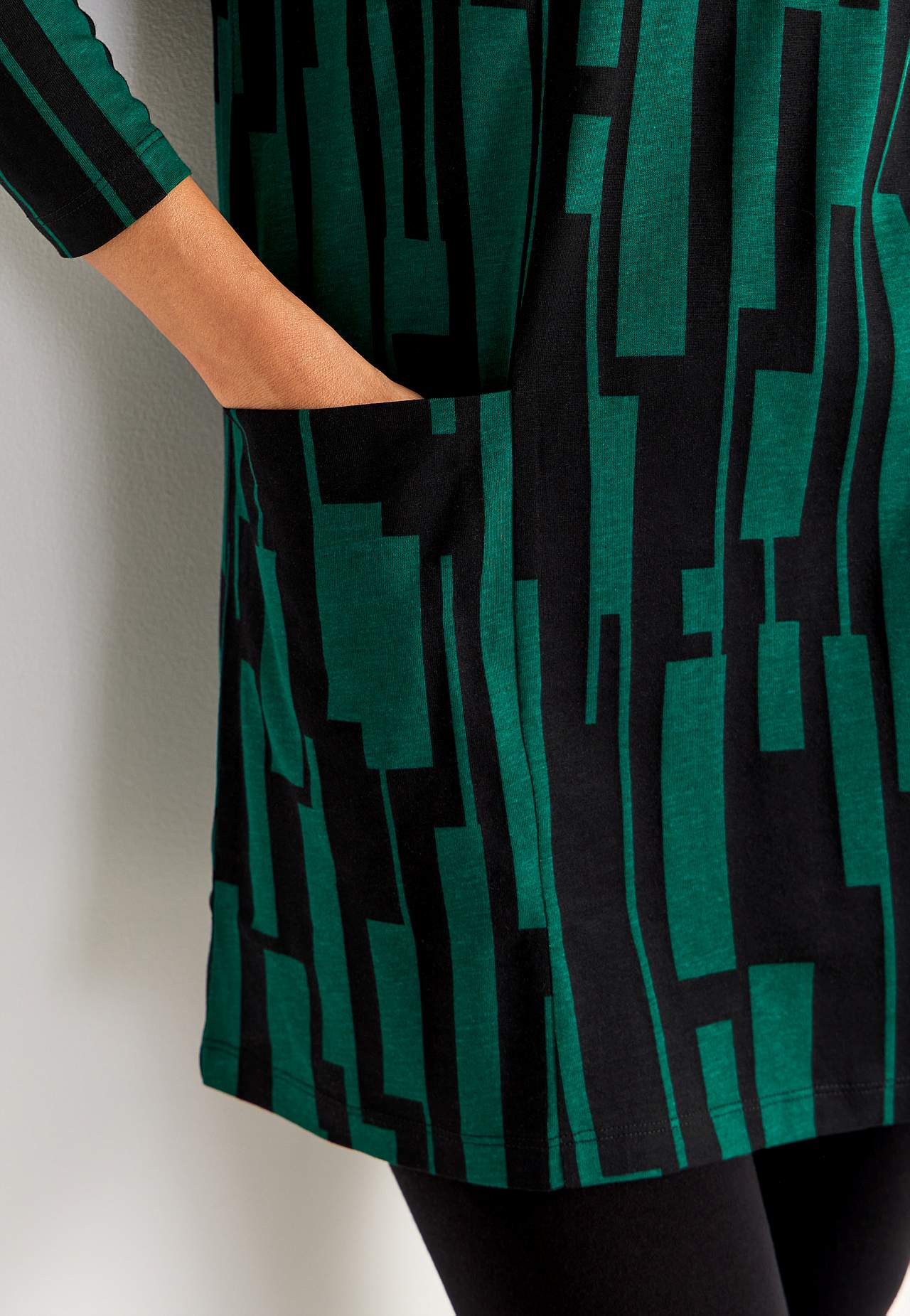 Jersey tuniek met zakken en een v-hals