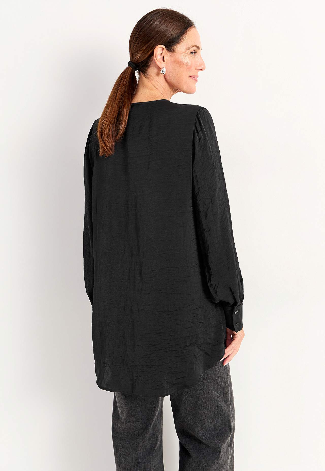 Tuniek met ruchekraag