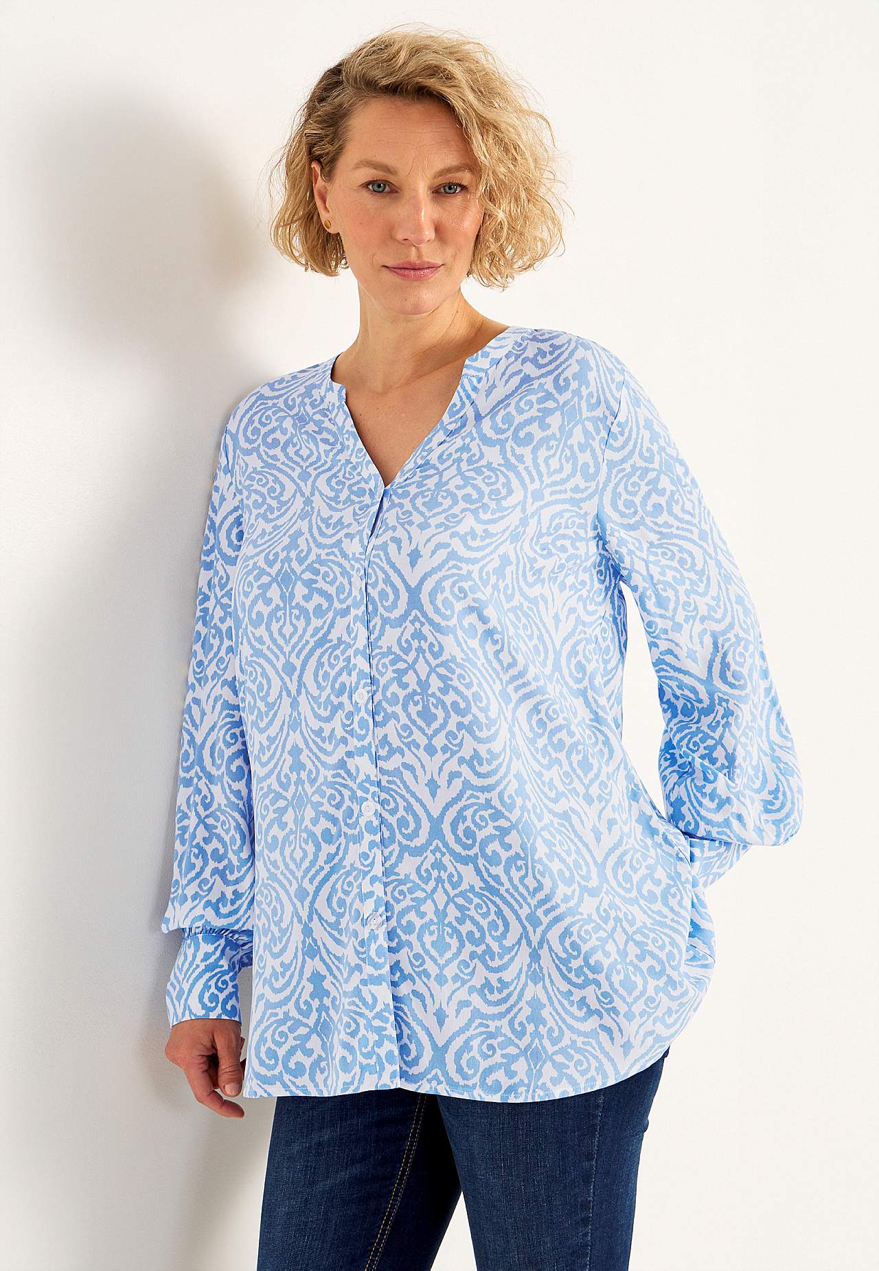 Gevlochten tuniek met knoppen