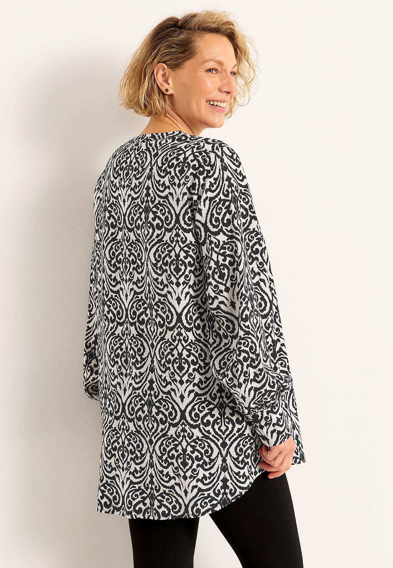 Gevlochten tuniek met knoppen