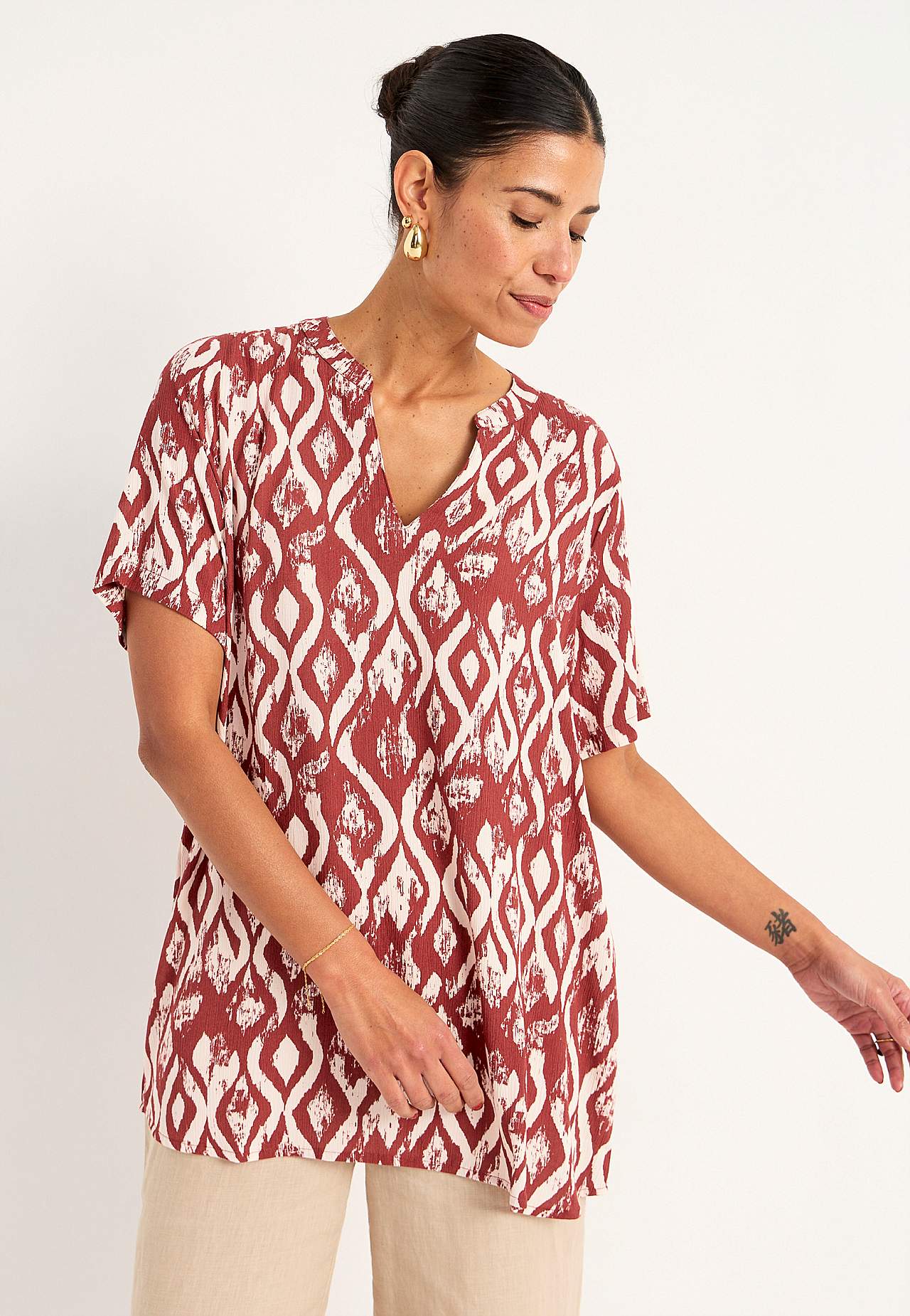 Van crèpe tuniek