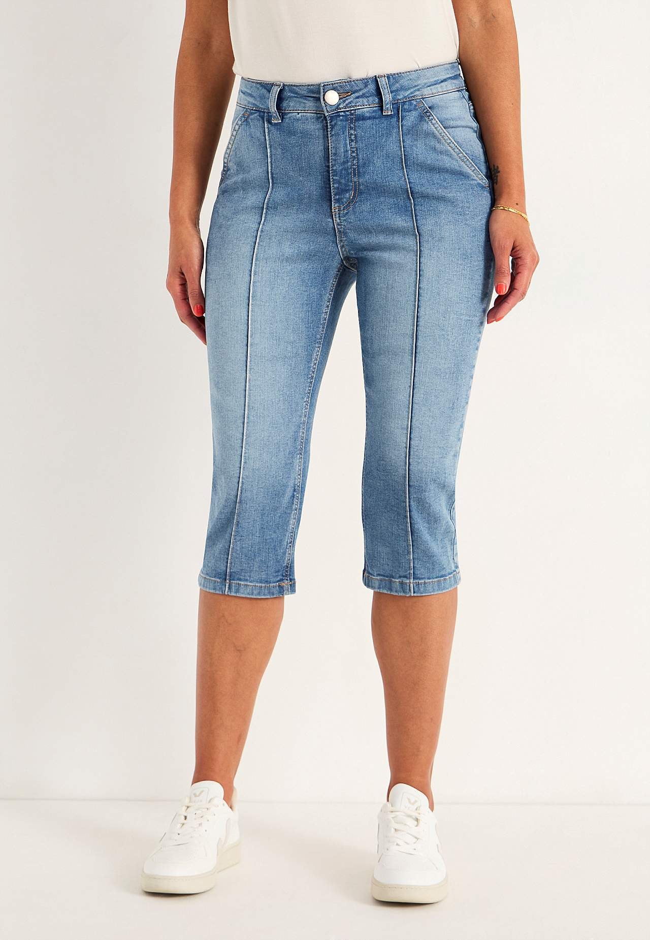 Elastische cropped jeans met gestikte vouw