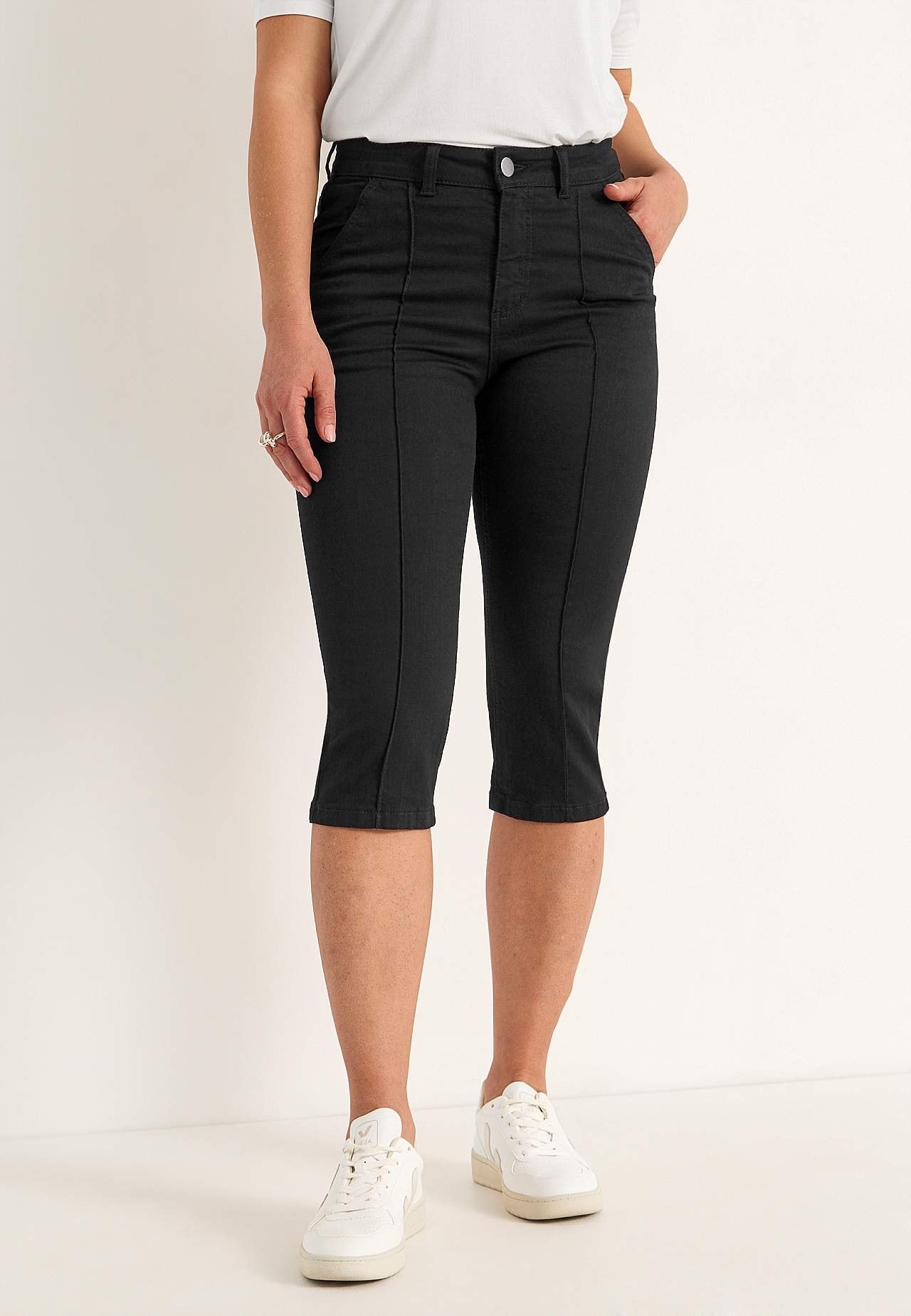Elastische cropped jeans met gestikte vouw