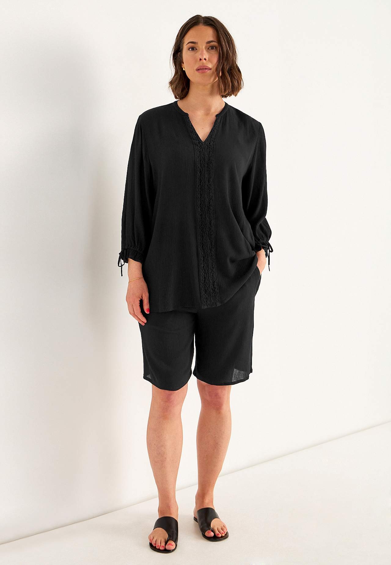 Van crèpe tuniek