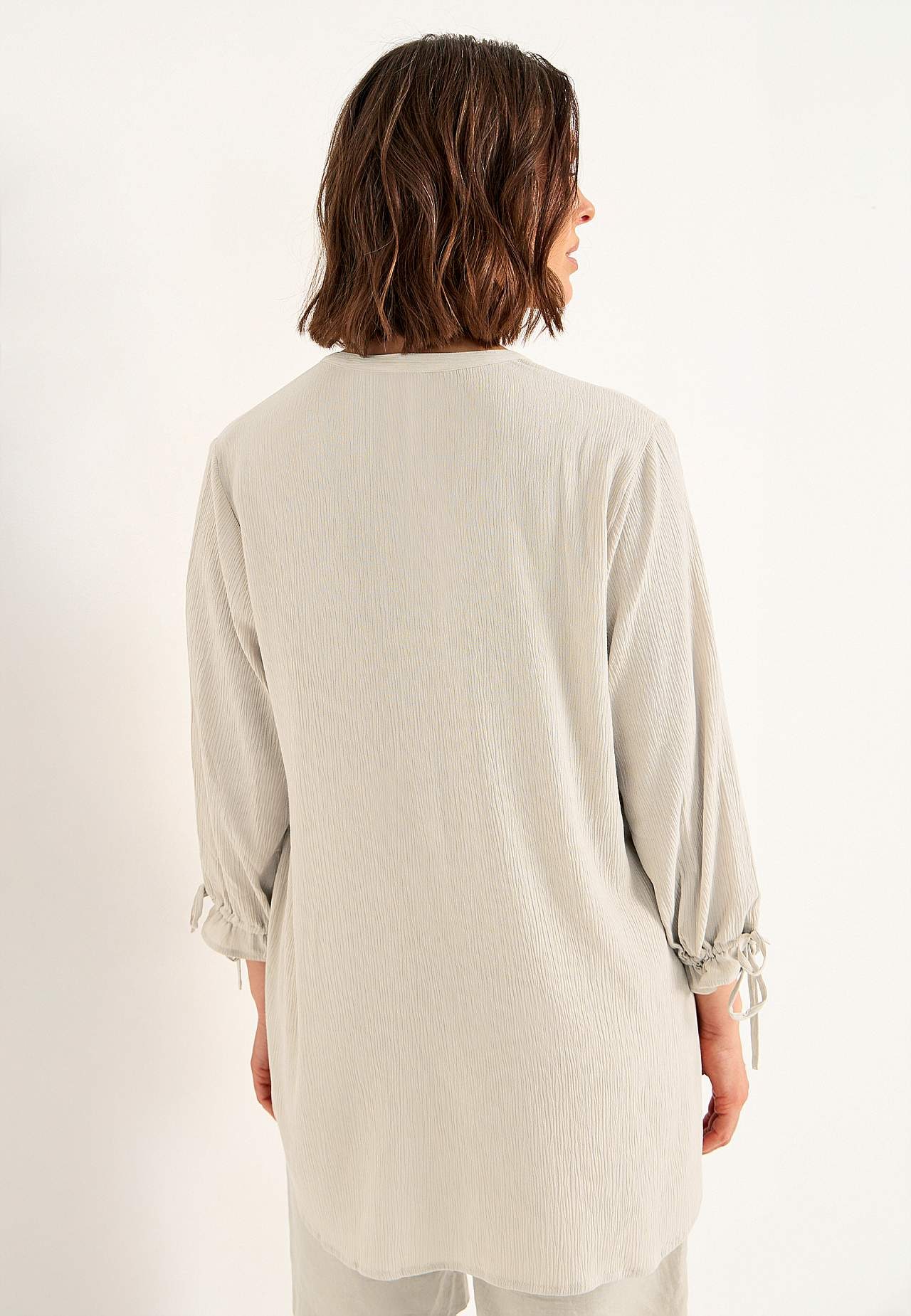 Van crèpe tuniek