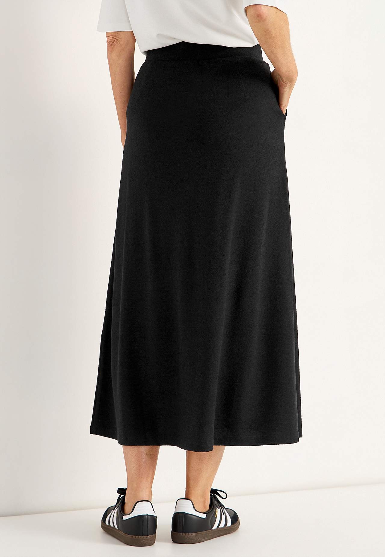 Flared jersey rok met zakken