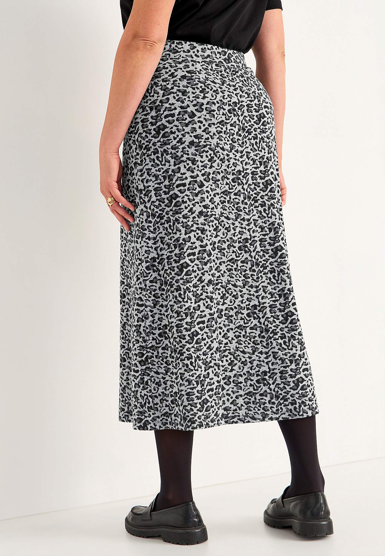 Flared jersey rok met zakken