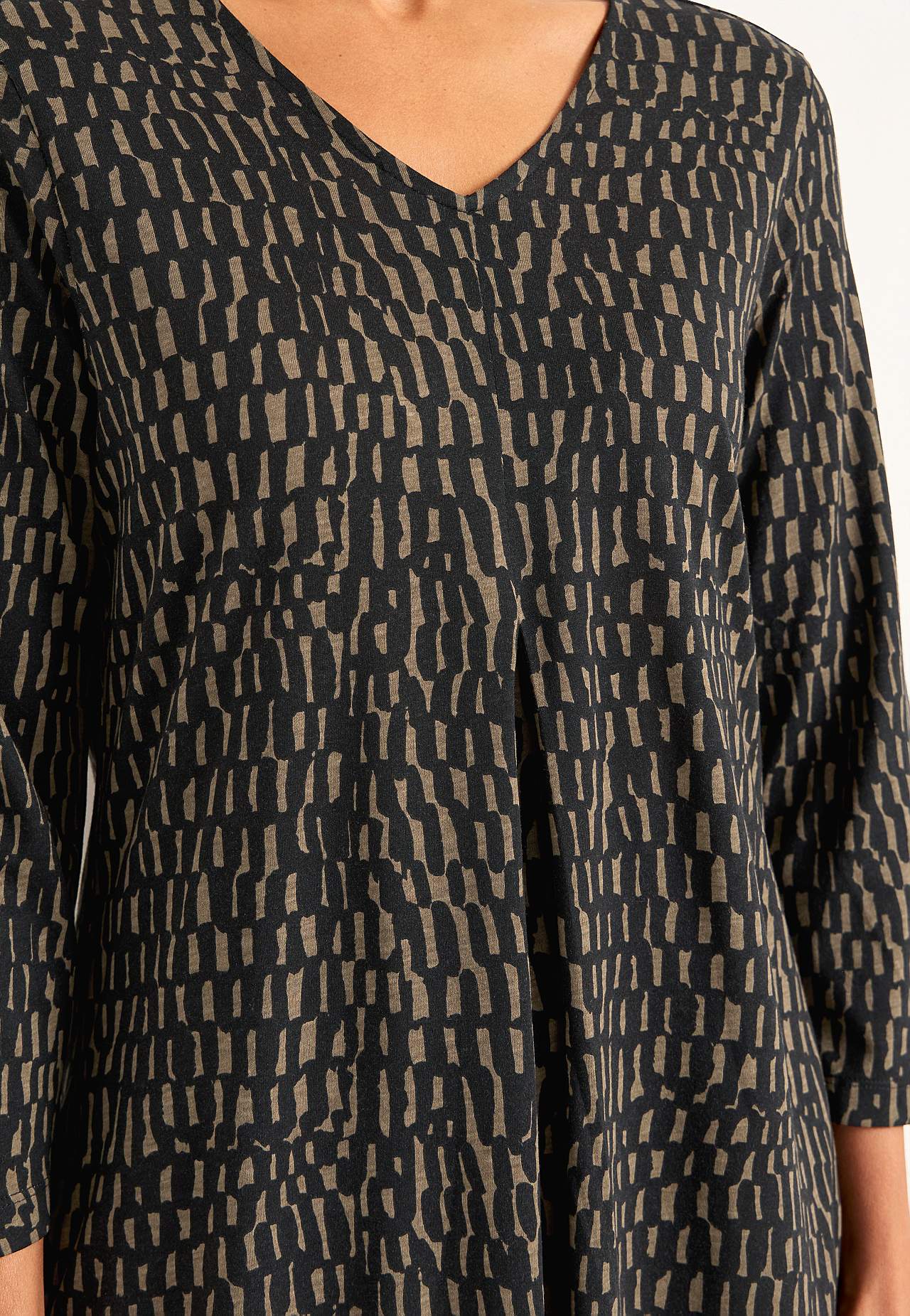 Jerseyjurk met een v-hals