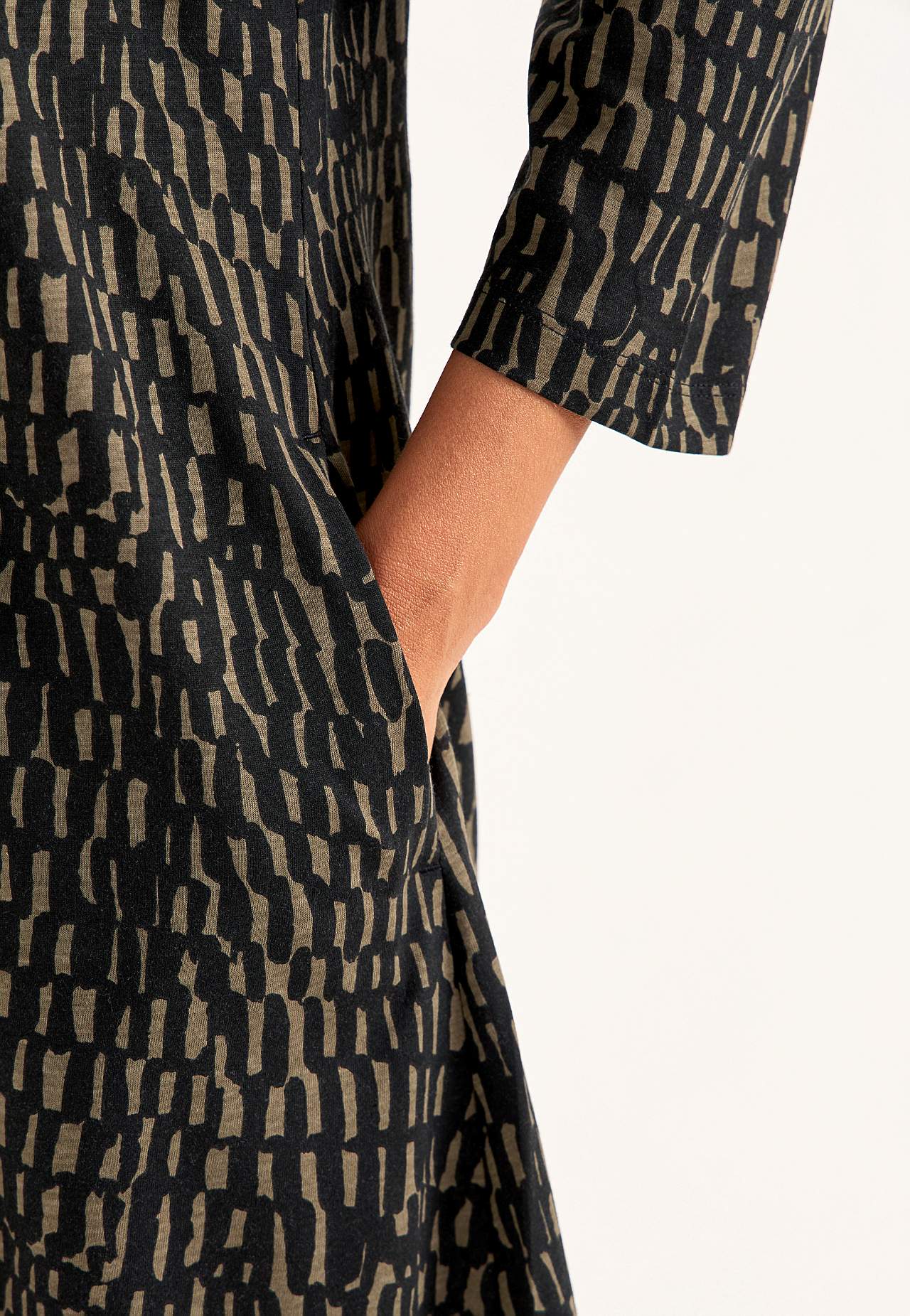Jerseyjurk met een v-hals