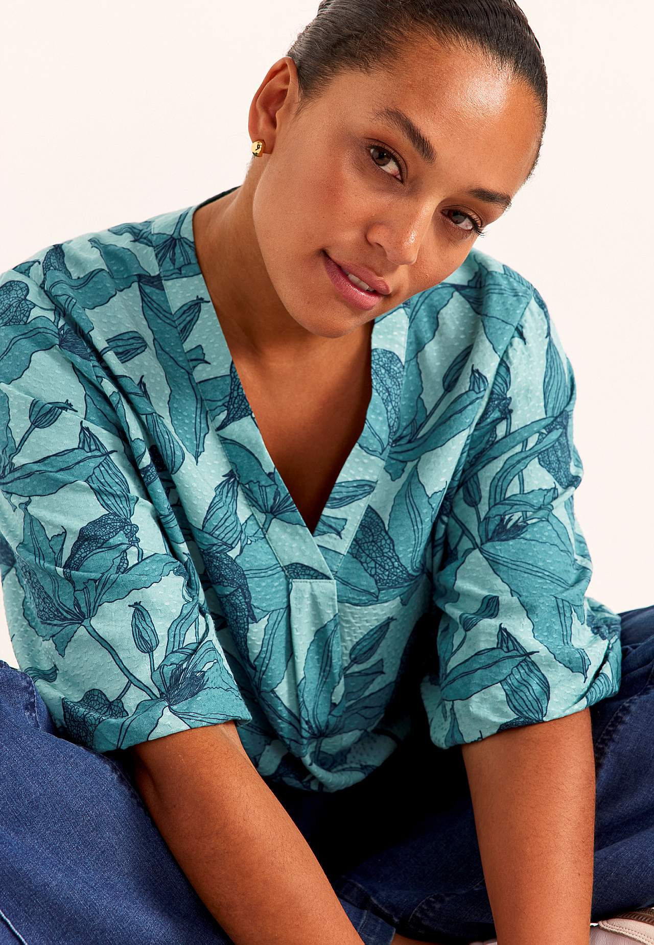 Gevlochten bloes met pofmouw