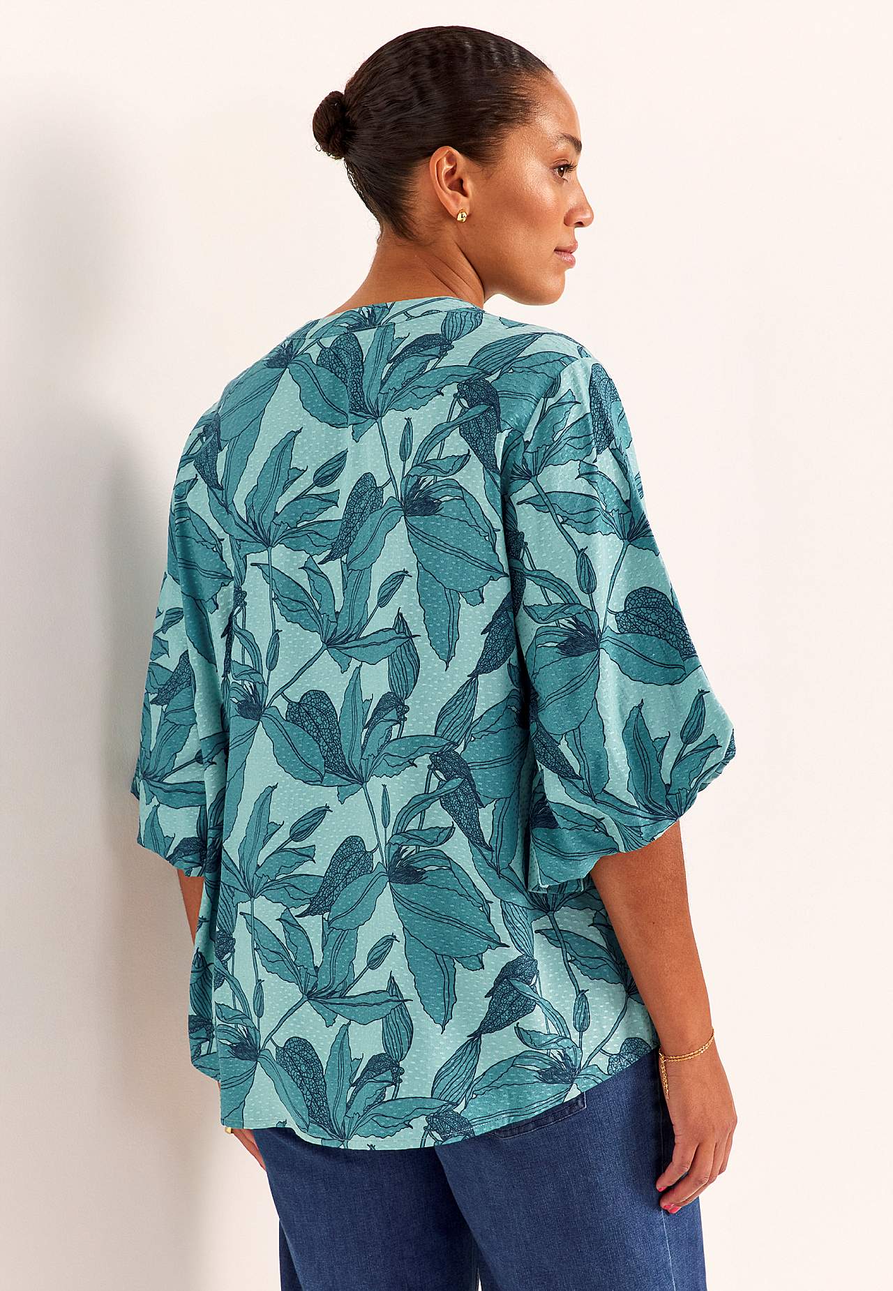 Gevlochten bloes met pofmouw