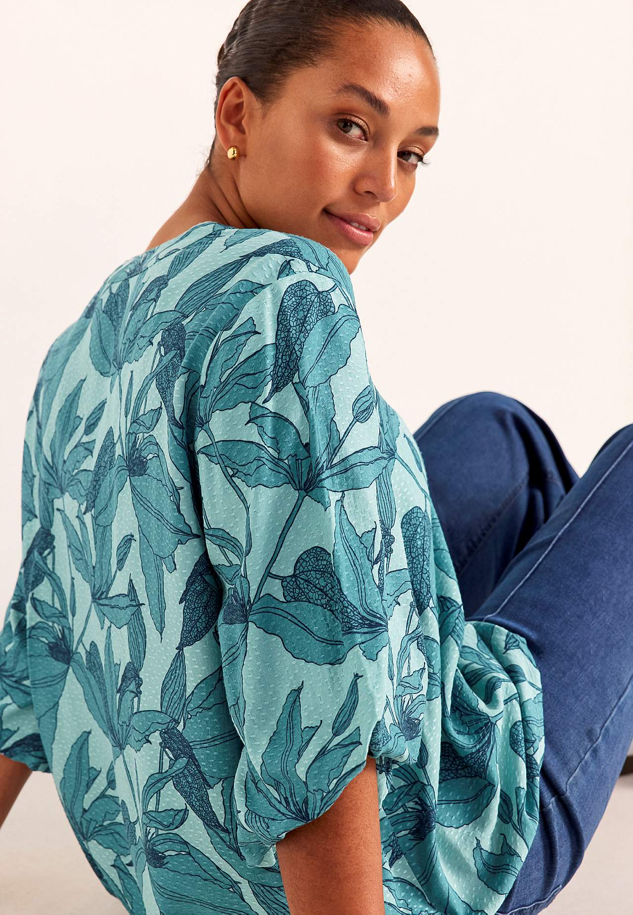 Gevlochten bloes met pofmouw