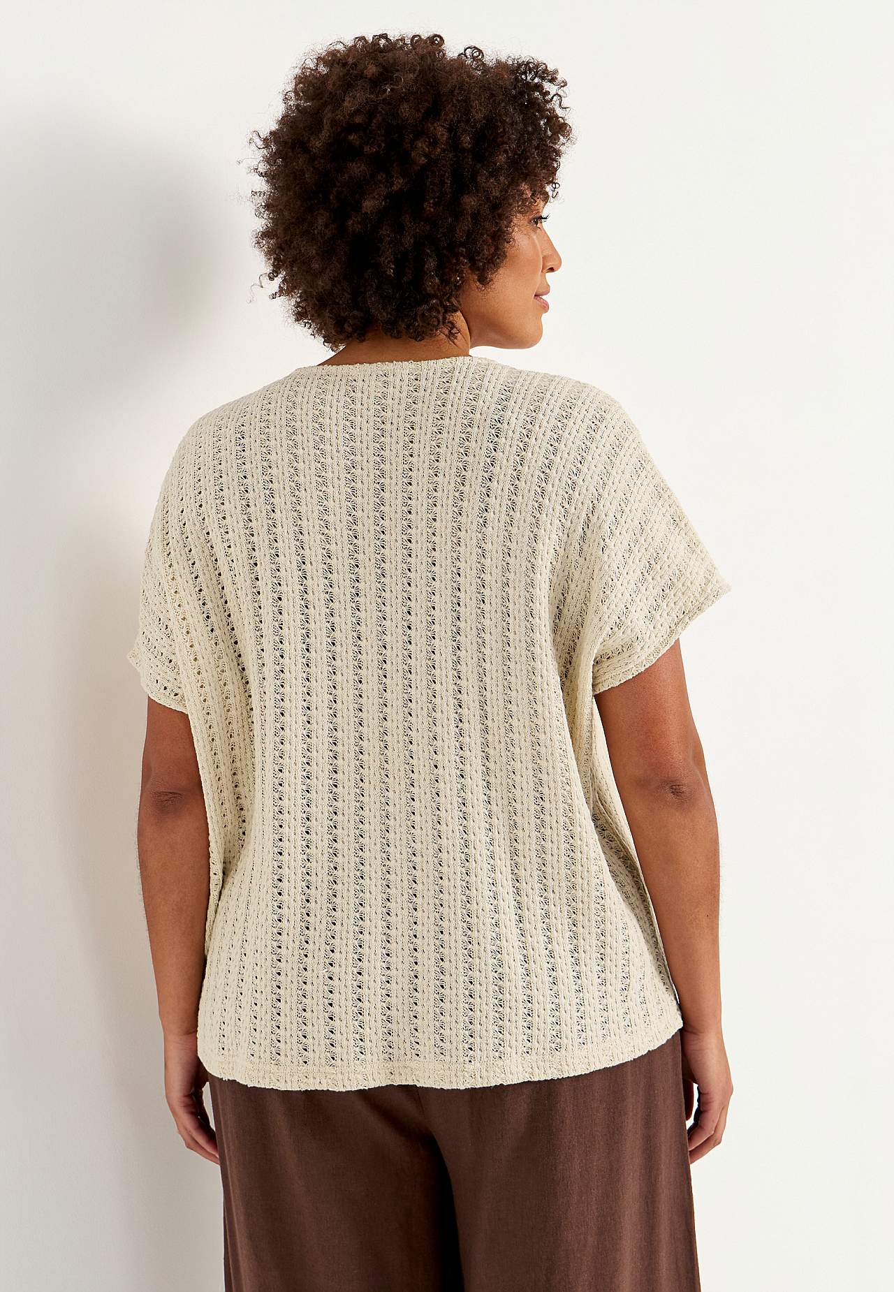 Jersey-topje met gatenpatroon